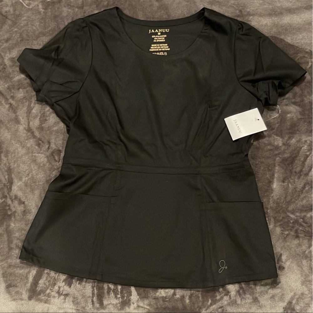 Jaanuu Peplum Scrub Top